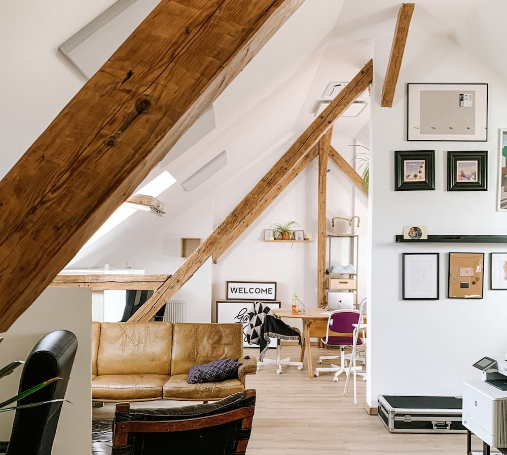 beautiful finished attic with exposed beams-a great home addition to increase space